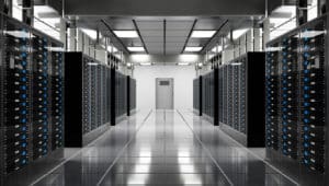 Large data center server room with servers in rows. 